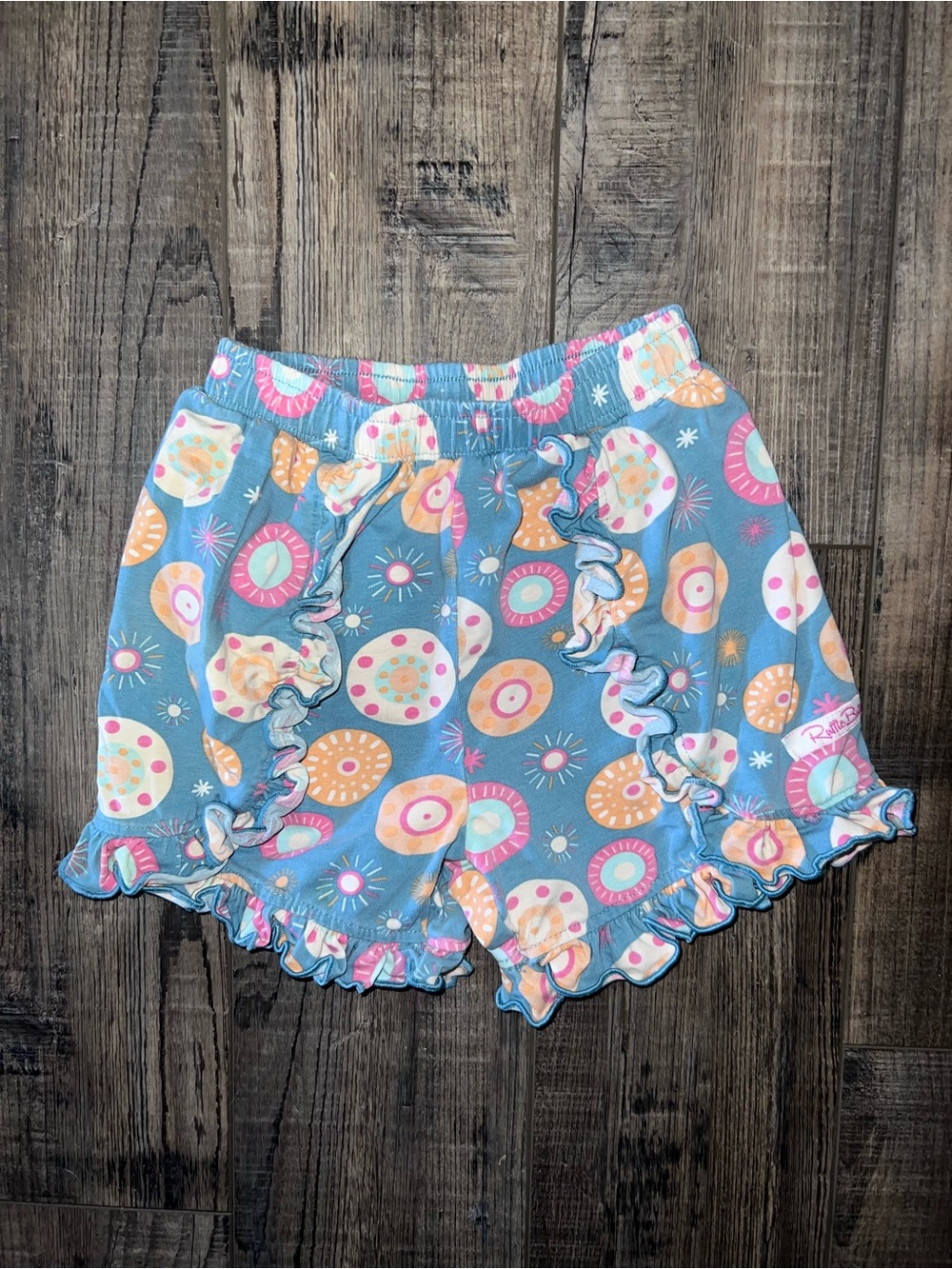 Ruffle Butts Ruffle Hem Kids Shorts with Pastel Donut Print